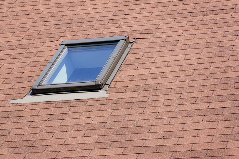 Roof Window On Tiled Roof